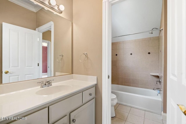 full bathroom featuring tile patterned floors, toilet, shower / washtub combination, and vanity