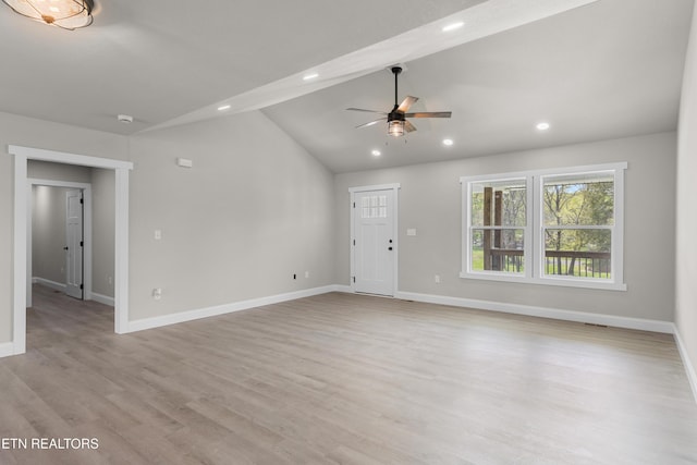 unfurnished living room featuring vaulted ceiling, light wood-type flooring, ceiling fan, baseboards, and recessed lighting