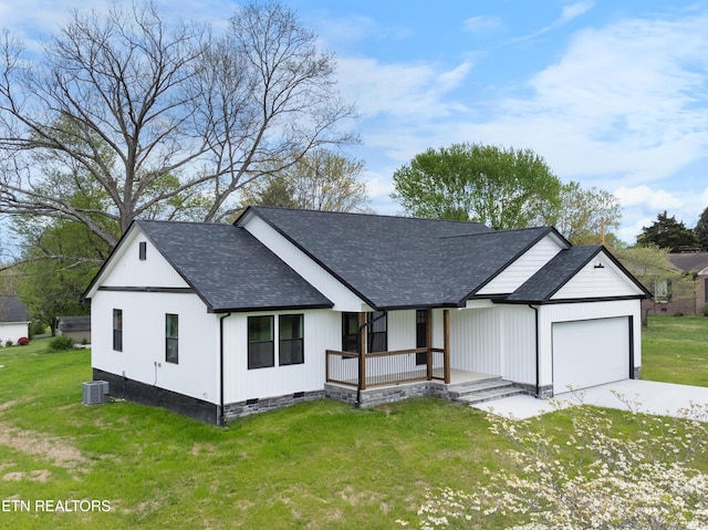 modern farmhouse featuring an attached garage, crawl space, covered porch, and a shingled roof