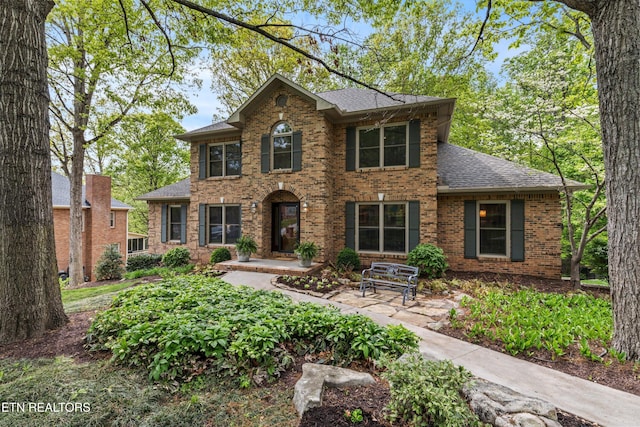 10617 Summit Mountain Ct, Knoxville, TN 37922 - colonial-style house featuring brick siding and roof with shingles