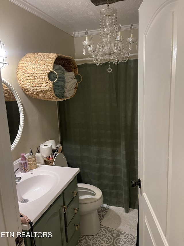 bathroom with a textured ceiling, an inviting chandelier, toilet, vanity, and tile patterned flooring