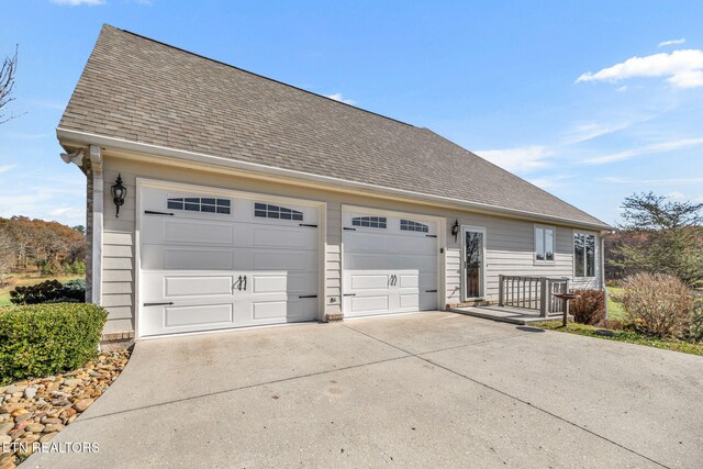 135 Austin Ln, Deer Lodge, TN 37726 - view of front of property with roof with shingles and concrete driveway