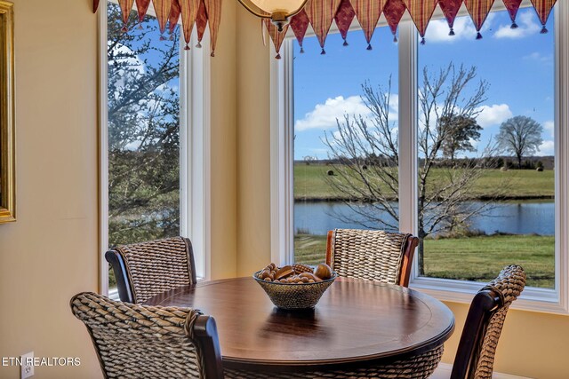 135 Austin Ln, Deer Lodge, TN 37726 - dining area featuring a water view