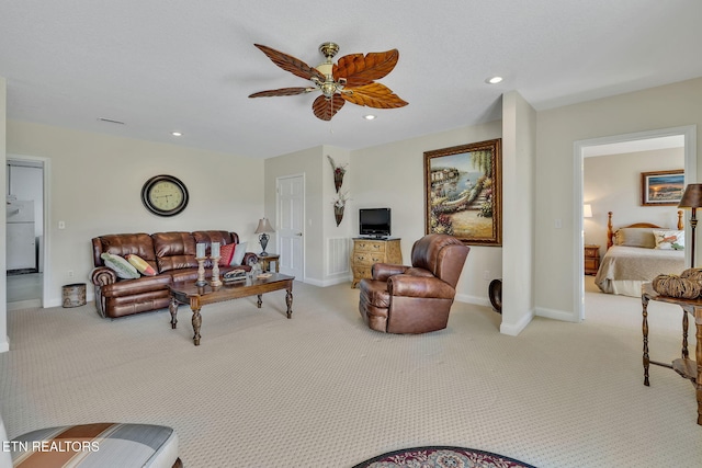 135 Austin Ln, Deer Lodge, TN 37726 - carpeted living room featuring baseboards, recessed lighting, and ceiling fan