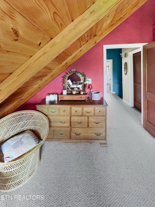 135 Austin Ln, Deer Lodge, TN 37726 - bedroom featuring lofted ceiling, light colored carpet, and light tile patterned flooring