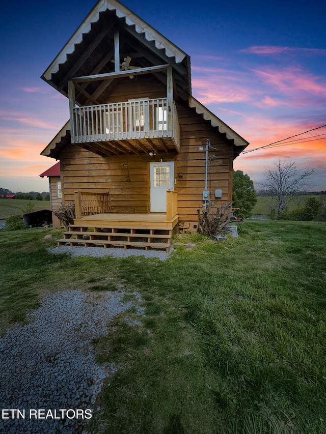 135 Austin Ln, Deer Lodge, TN 37726 - back of property with a yard, a balcony, and a deck