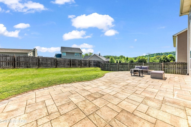 view of patio / terrace featuring an outdoor living space and a fenced backyard
