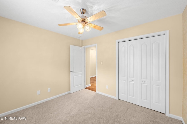 7143 La Christa Way, Knoxville, TN 37921 - unfurnished bedroom featuring a ceiling fan, baseboards, a closet, and carpet