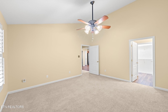 7143 La Christa Way, Knoxville, TN 37921 - unfurnished bedroom with baseboards, a spacious closet, carpet, ceiling fan, and high vaulted ceiling