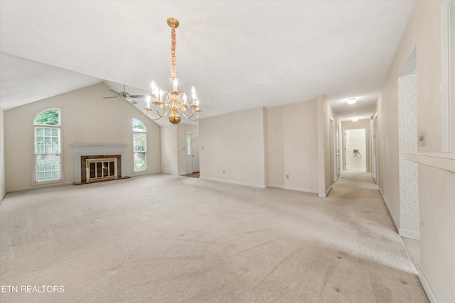 3804 Whitworth Dr, Knoxville, TN 37938 - unfurnished living room featuring baseboards, a glass covered fireplace, light colored carpet, ceiling fan with notable chandelier, and lofted ceiling