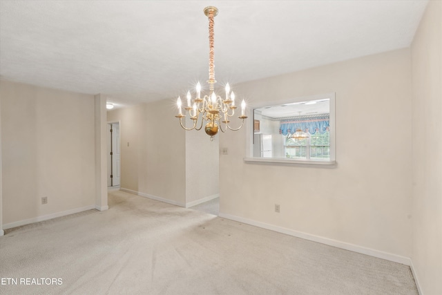 3804 Whitworth Dr, Knoxville, TN 37938 - unfurnished dining area with baseboards, carpet, and a notable chandelier