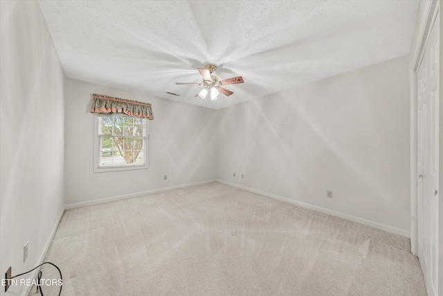 3804 Whitworth Dr, Knoxville, TN 37938 - unfurnished room featuring baseboards, a ceiling fan, and carpet flooring