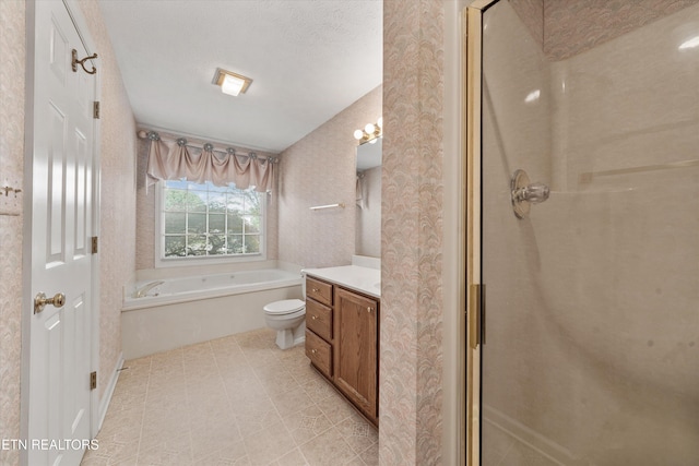 3804 Whitworth Dr, Knoxville, TN 37938 - full bathroom featuring a garden tub, wallpapered walls, a stall shower, vanity, and toilet