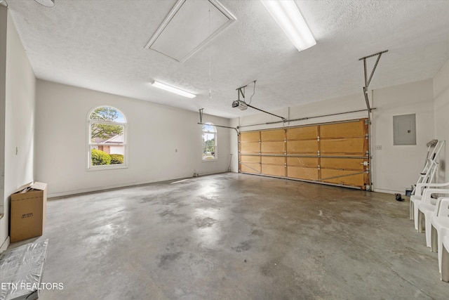 3804 Whitworth Dr, Knoxville, TN 37938 - garage with a garage door opener and electric panel