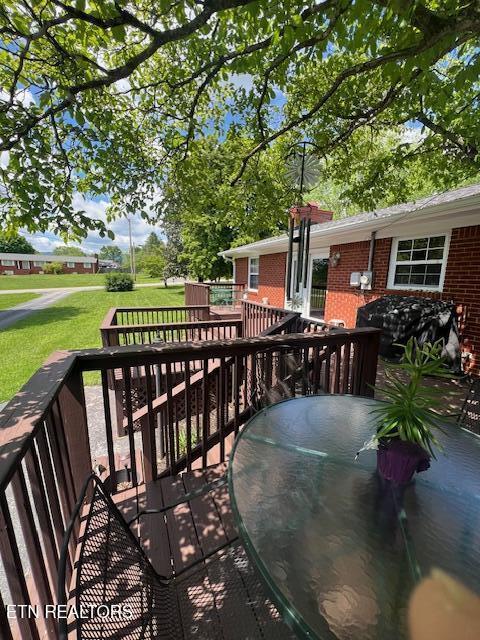 205 Hickory Ln, Jacksboro, TN 37757 - wooden deck featuring a yard