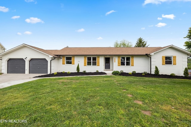 ranch-style house featuring roof with shingles, a front yard, driveway, and an attached garage