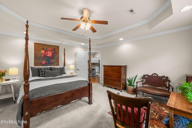carpeted bedroom featuring crown molding, a raised ceiling, recessed lighting, a ceiling fan, and visible vents