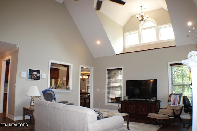 184 Danielle Ct, Harrogate, TN 37752 - living room with a wealth of natural light, high vaulted ceiling, and ceiling fan with notable chandelier