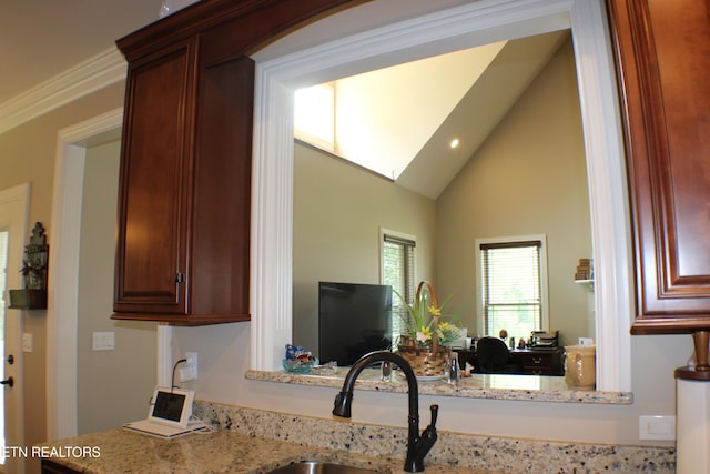 184 Danielle Ct, Harrogate, TN 37752 - kitchen with a sink, recessed lighting, high vaulted ceiling, and light stone counters