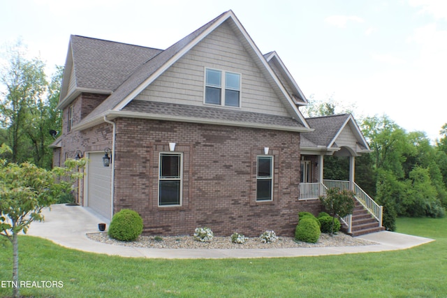 184 Danielle Ct, Harrogate, TN 37752 - view of home's exterior with a porch, a shingled roof, a yard, brick siding, and concrete driveway