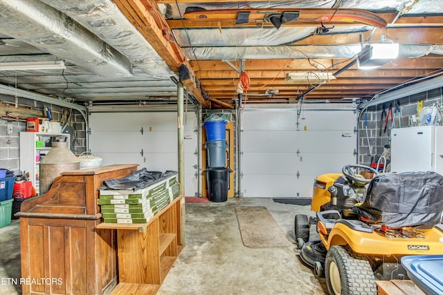 garage featuring white refrigerator