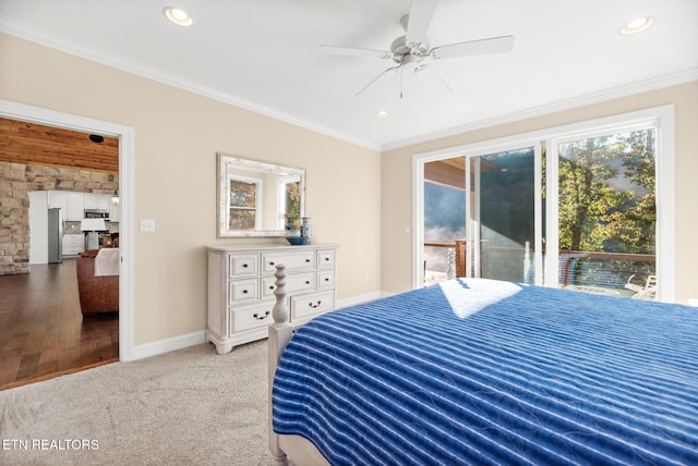 carpeted bedroom featuring baseboards, recessed lighting, and ornamental molding