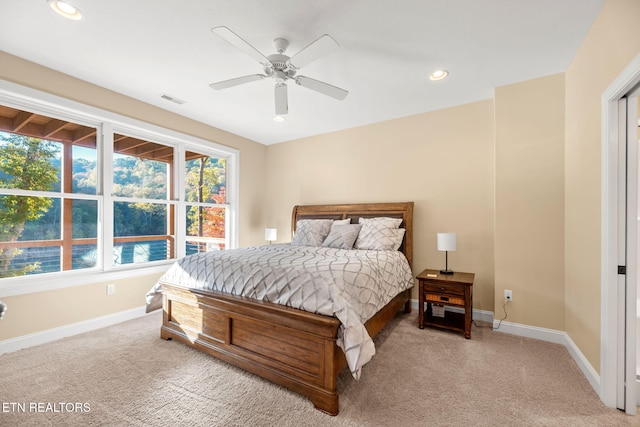 carpeted bedroom with baseboards, a ceiling fan, visible vents, and recessed lighting