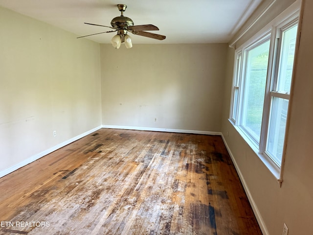 321 Walnut Valley Rd, Clinton, TN 37716 - unfurnished room with hardwood / wood-style floors, a ceiling fan, and baseboards