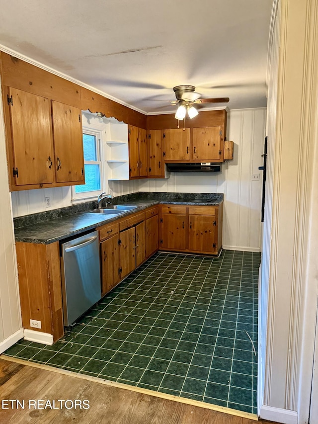 321 Walnut Valley Rd, Clinton, TN 37716 - kitchen featuring stainless steel dishwasher, a sink, dark countertops, a ceiling fan, and brown cabinets