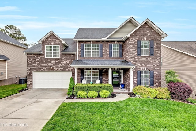 view of front of property featuring covered porch, brick siding, a front yard, and an attached garage