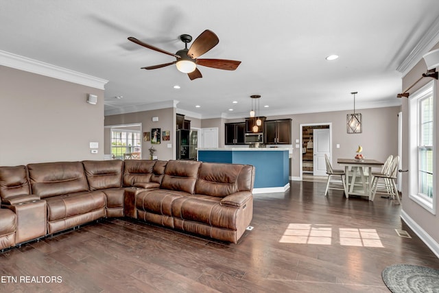 living room with dark wood-style floors, recessed lighting, a ceiling fan, and a healthy amount of sunlight