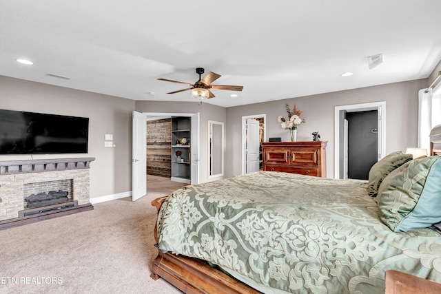 bedroom with recessed lighting, visible vents, light carpet, and baseboards