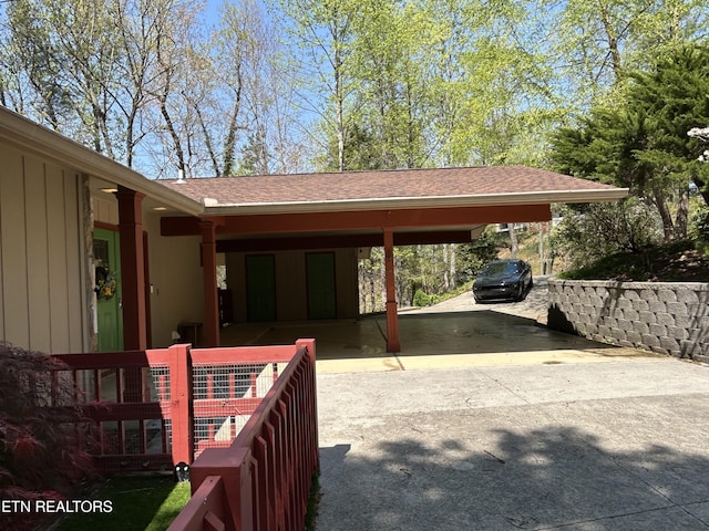 1713 Cardinal Dr, Gatlinburg, TN 37738 - view of car parking with driveway and a carport
