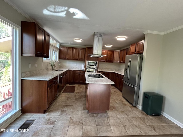 1713 Cardinal Dr, Gatlinburg, TN 37738 - kitchen featuring a sink, stainless steel appliances, island exhaust hood, visible vents, and a kitchen island