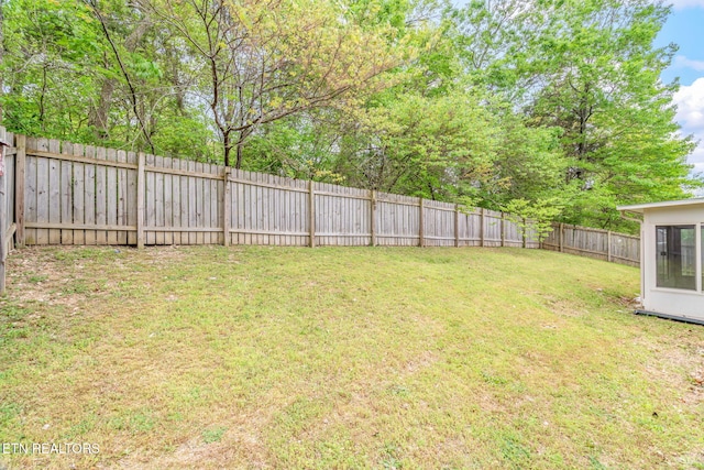 view of yard featuring a fenced backyard