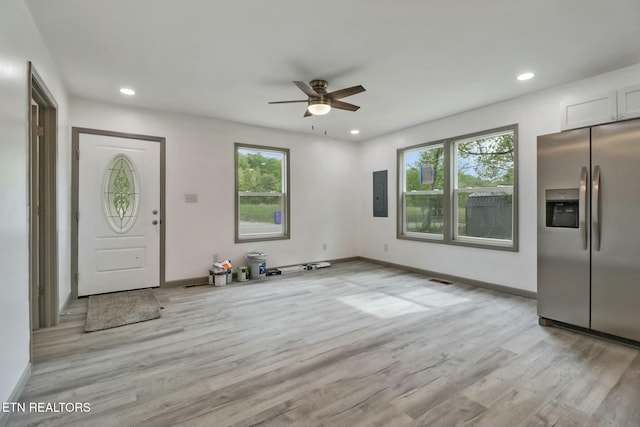 entryway featuring electric panel, light wood-style flooring, baseboards, recessed lighting, and a ceiling fan