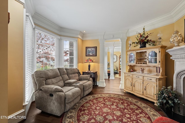 living room with baseboards, ornamental molding, dark wood-style flooring, and ornate columns