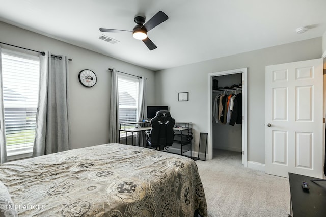 bedroom with visible vents, ceiling fan, a closet, baseboards, and carpet floors