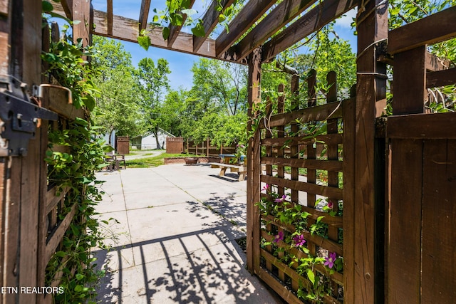 view of patio / terrace with fence