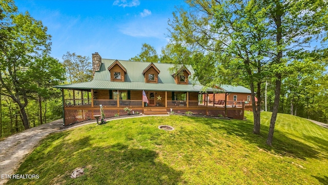 761 N Knob Creek Rd, Seymour, TN 37865 - view of front of house featuring a porch, a front lawn, a chimney, and driveway