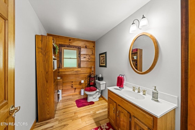 761 N Knob Creek Rd, Seymour, TN 37865 - bathroom featuring wood finished floors, wooden walls, toilet, and vanity
