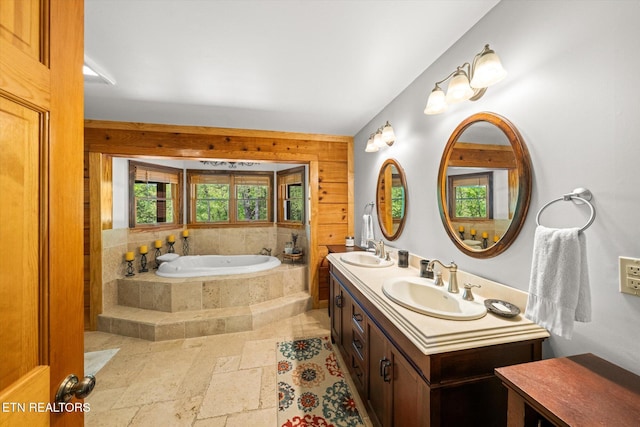761 N Knob Creek Rd, Seymour, TN 37865 - bathroom featuring stone tile flooring, a garden tub, and double vanity