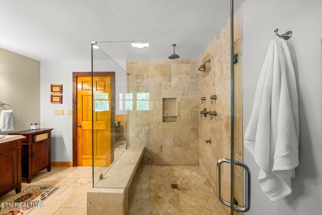761 N Knob Creek Rd, Seymour, TN 37865 - bathroom featuring a stall shower, vanity, and baseboards