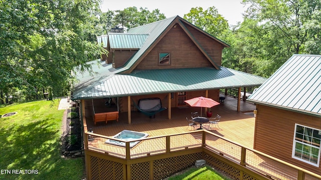 761 N Knob Creek Rd, Seymour, TN 37865 - wooden deck with a yard, outdoor dining space, and view of scattered trees