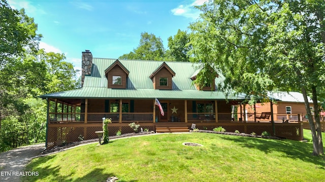 761 N Knob Creek Rd, Seymour, TN 37865 - farmhouse-style home featuring covered porch, a chimney, and a front yard