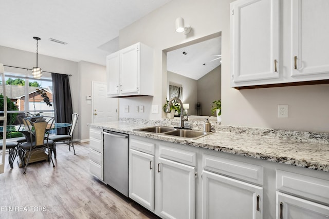 kitchen with stainless steel dishwasher, a sink, light wood-type flooring, white cabinets, and visible vents