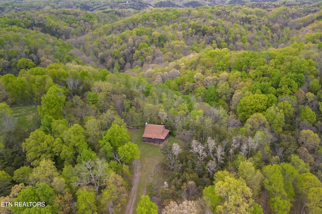aerial view with a wooded view