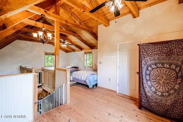 bedroom with lofted ceiling with beams, wooden ceiling, wood finished floors, and ceiling fan