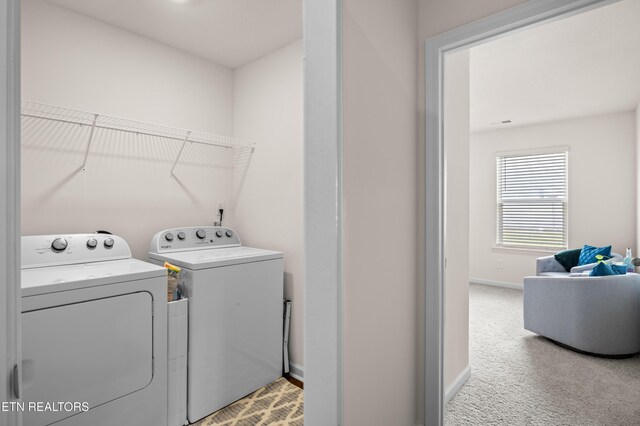 1423 Ridge Estates Dr, Athens, TN 37303 - laundry area featuring independent washer and dryer, baseboards, and light colored carpet