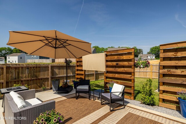 1423 Ridge Estates Dr, Athens, TN 37303 - wooden deck featuring a fenced backyard, outdoor lounge area, and a patio